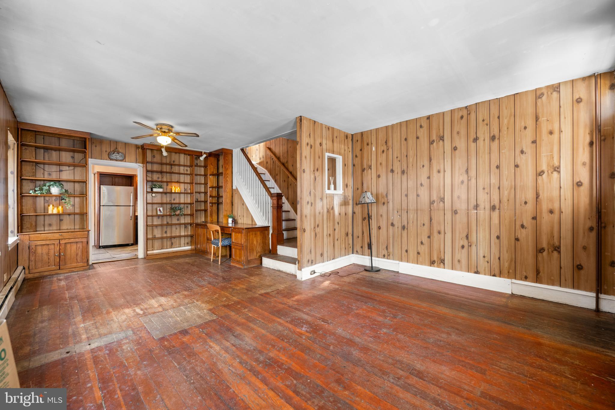 458 Renfrew Avenue Ambler, PA 19002 - Photo 8 of 31 a view of an empty room with wooden floor and stairs