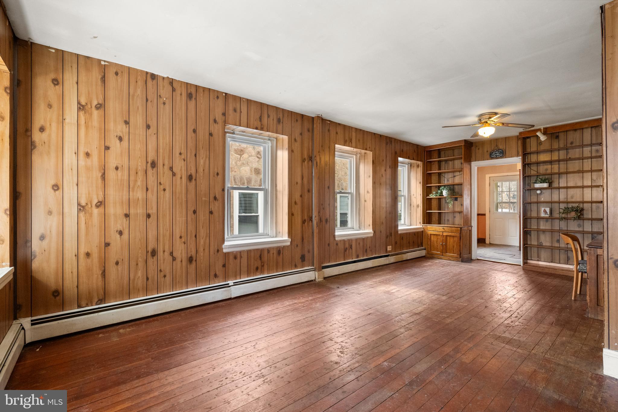 458 Renfrew Avenue Ambler, PA 19002 - Photo 9 of 31 an empty room with wooden floor and windows