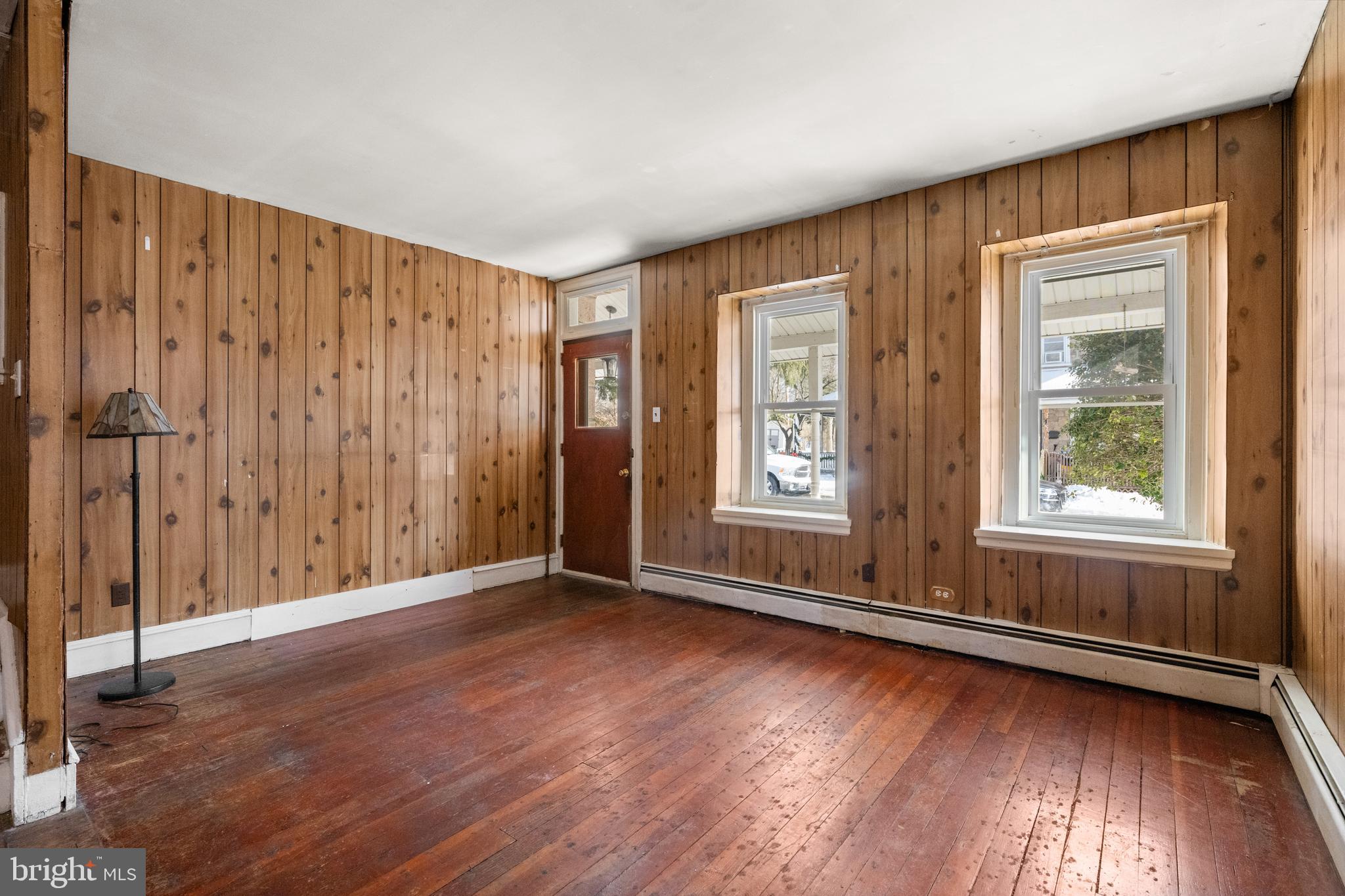 458 Renfrew Avenue Ambler, PA 19002 - Photo 10 of 31 an empty room with wooden floor and windows