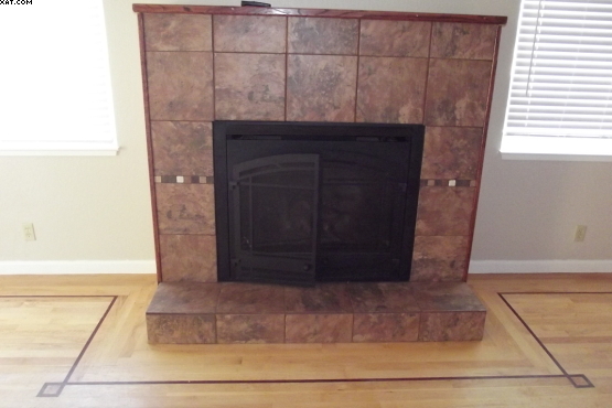 15710 Cloverdale Road Anderson, CA 96007 - Photo 5 of 12 fireplace and wood floor inlay