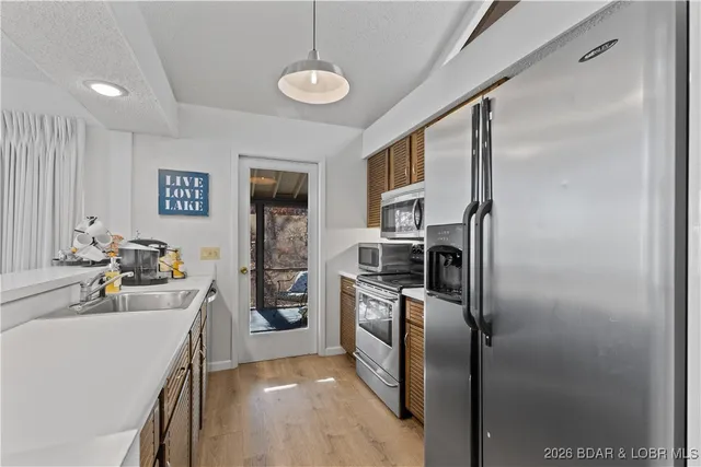 $400,000 | 216 Bent Shadow Lane, Osage Beach, MO 65065