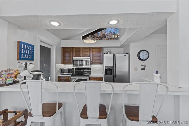 $400,000 | 216 Bent Shadow Lane, Osage Beach, MO 65065