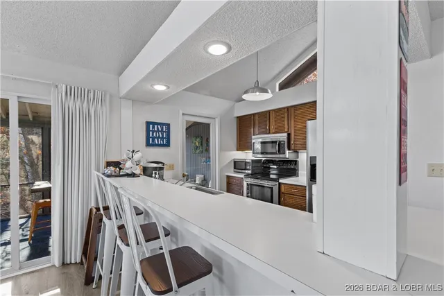 $400,000 | 216 Bent Shadow Lane, Osage Beach, MO 65065