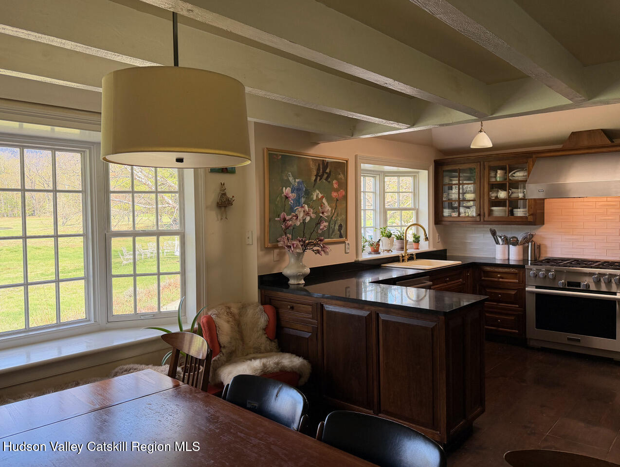 84 Sickler Road Lake Hill, NY 12448 - Photo 12 of 24 a kitchen with a stove and a refrigerator