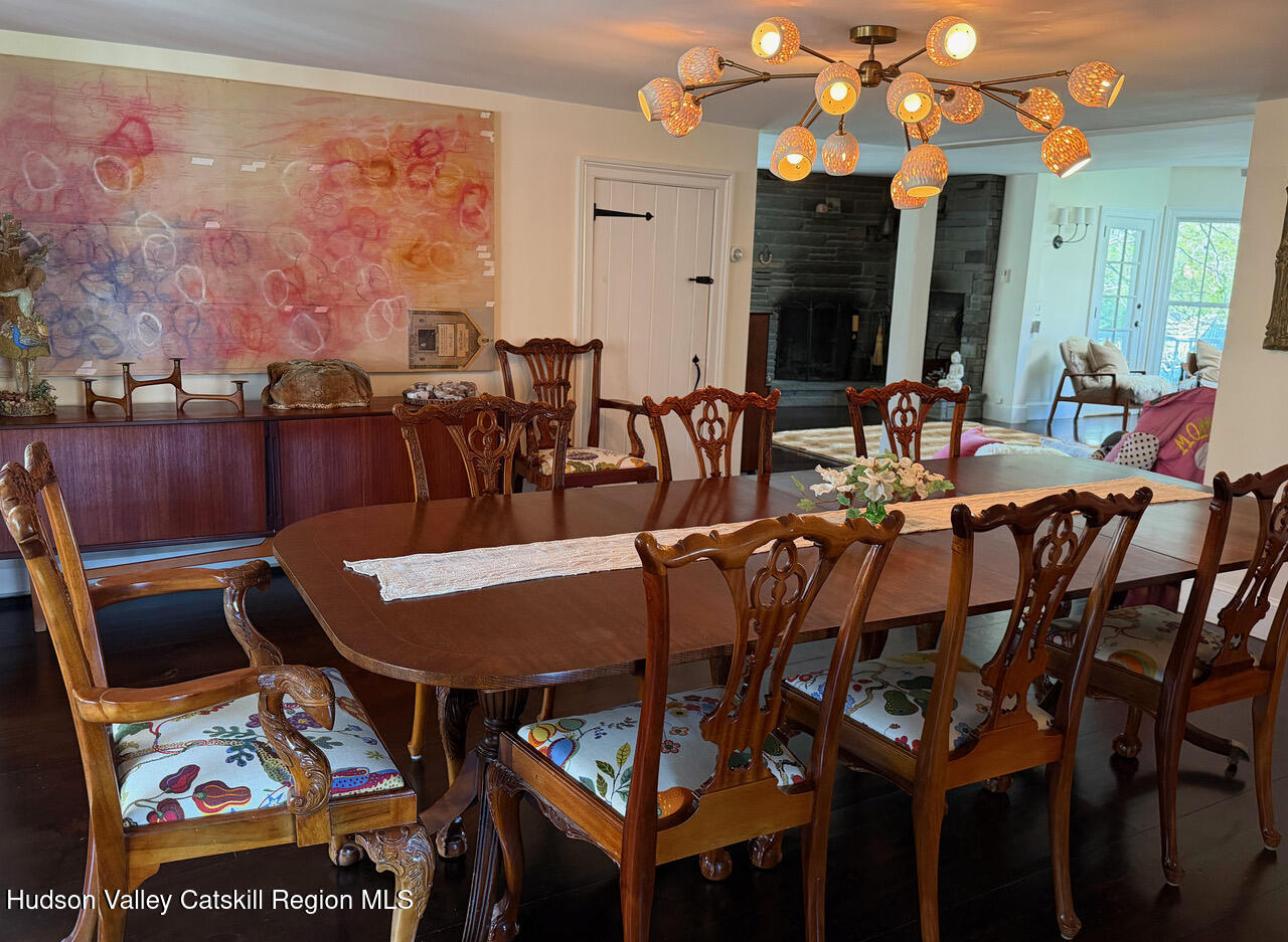 84 Sickler Road Lake Hill, NY 12448 - Photo 14 of 24 a view of a dining room with furniture and wooden floor