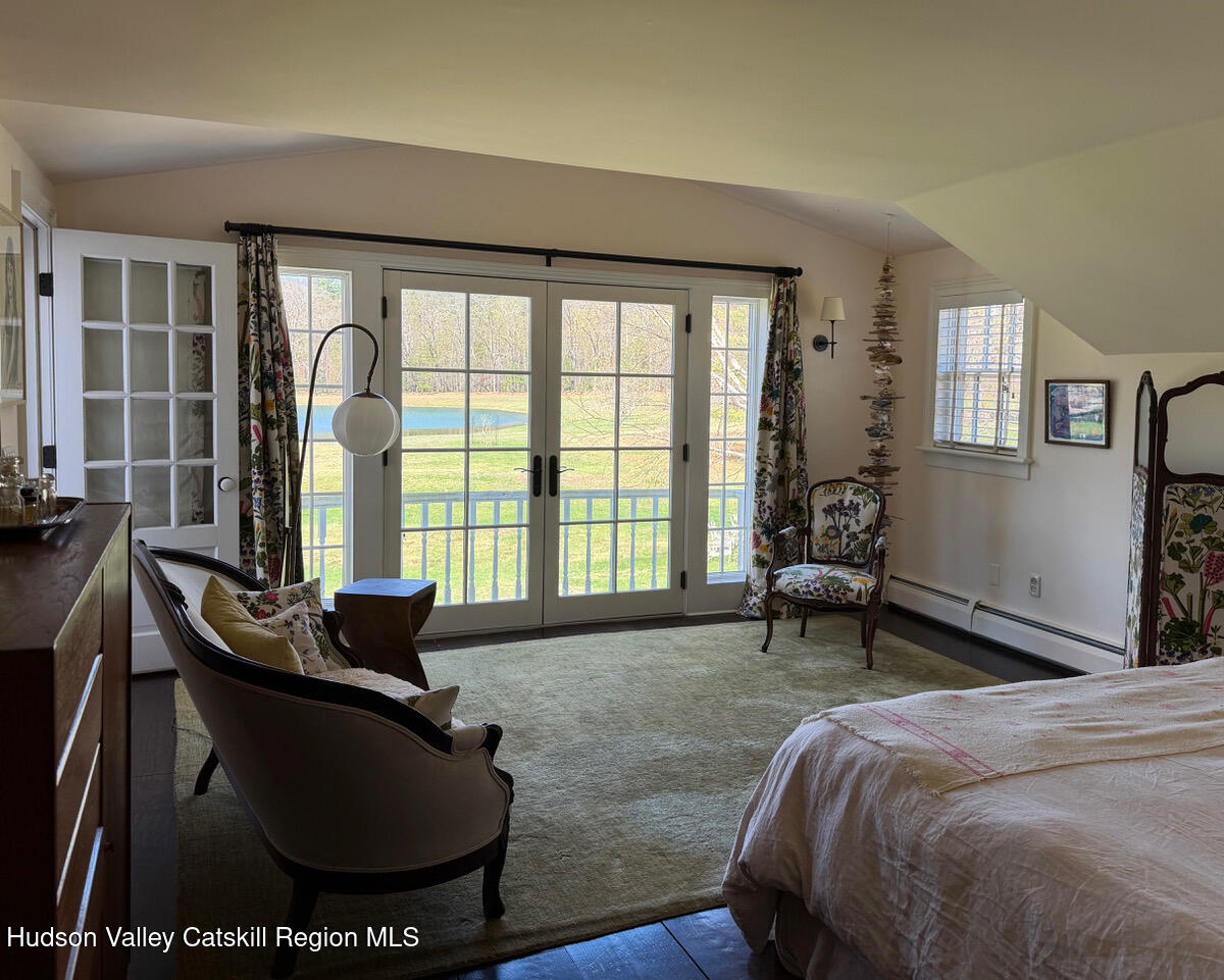 84 Sickler Road Lake Hill, NY 12448 - Photo 15 of 24 a living room with furniture and a window