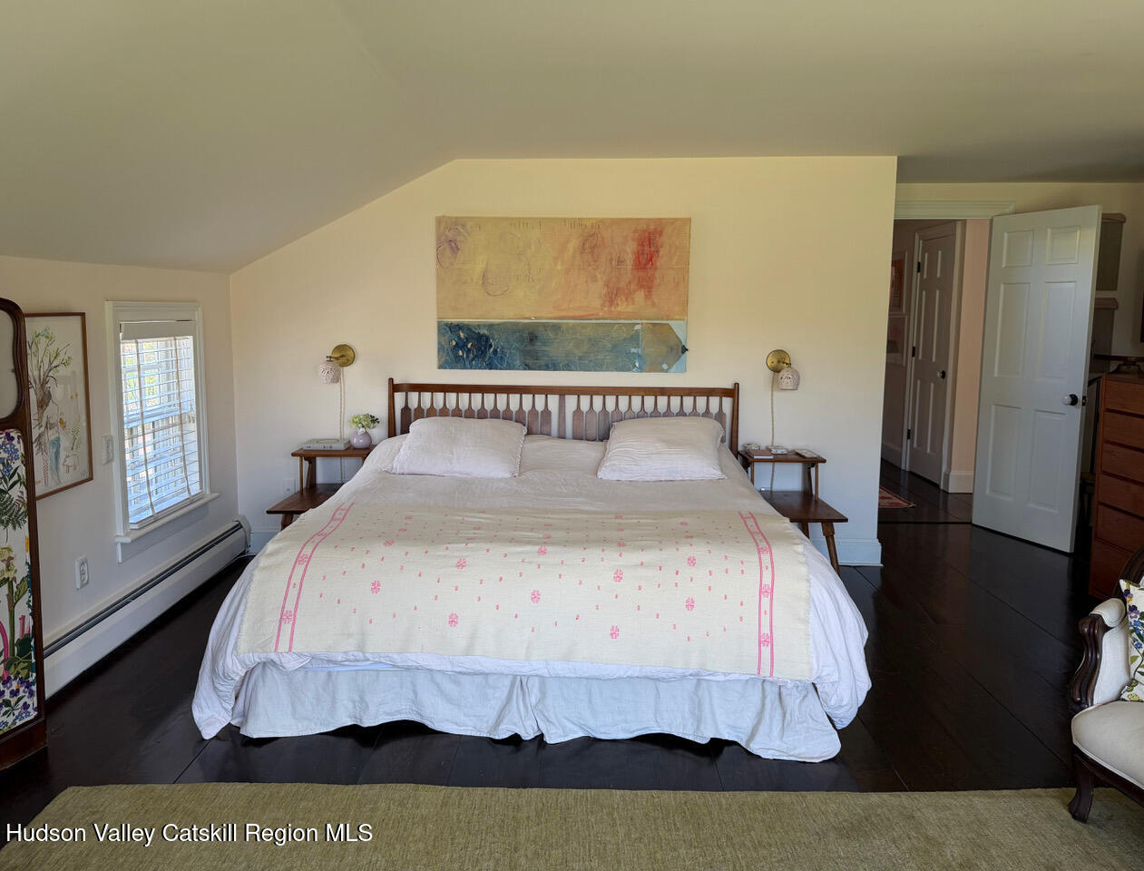 84 Sickler Road Lake Hill, NY 12448 - Photo 16 of 24 a bedroom with a bed and wooden floor