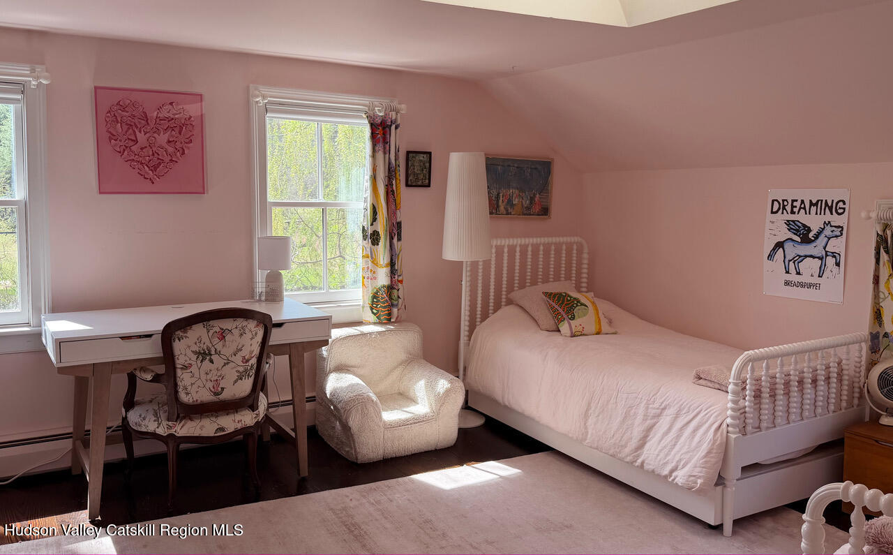 84 Sickler Road Lake Hill, NY 12448 - Photo 19 of 24 a bedroom with a bed and a window