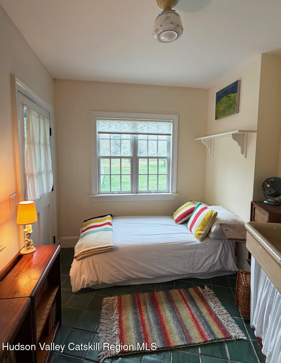 84 Sickler Road Lake Hill, NY 12448 - Photo 21 of 24 a bedroom with a bed and window