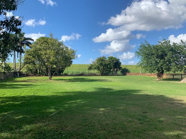1631 Bacom Point Road Pahokee, FL 33476 - Photo 19 of 19 a view of a park with large trees