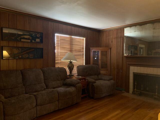 1631 Bacom Point Road Pahokee, FL 33476 - Photo 2 of 19 a living room with furniture and a fireplace