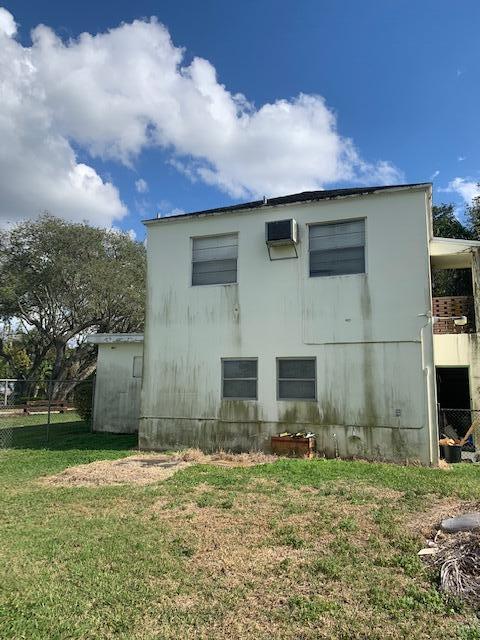1631 Bacom Point Road Pahokee, FL 33476 - Photo 6 of 19 a backyard of a house with lots of green space