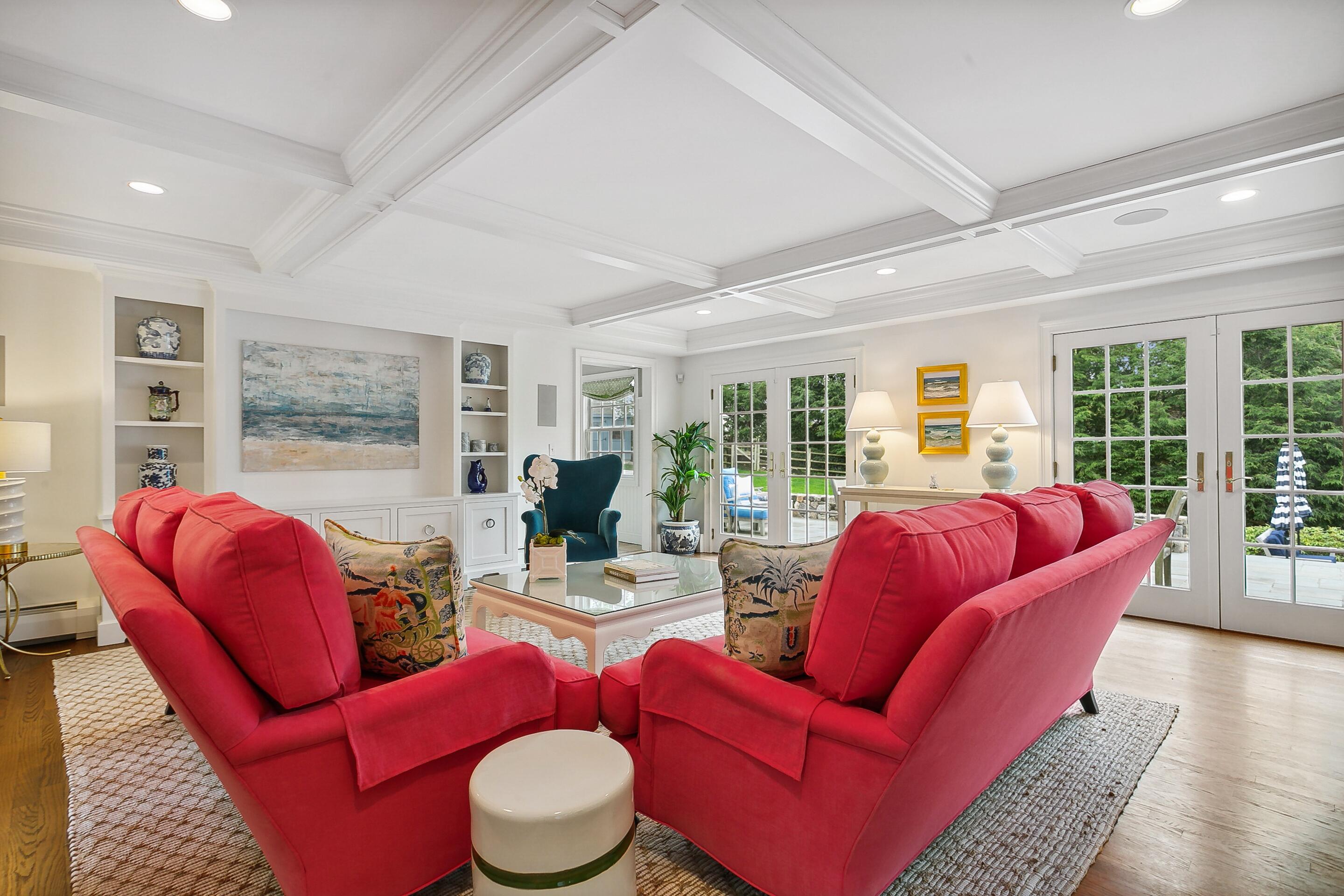 64 Summit Ridge Road New Canaan, CT 06840 - Photo 13 of 39 a living room with furniture a large window and wooden floor