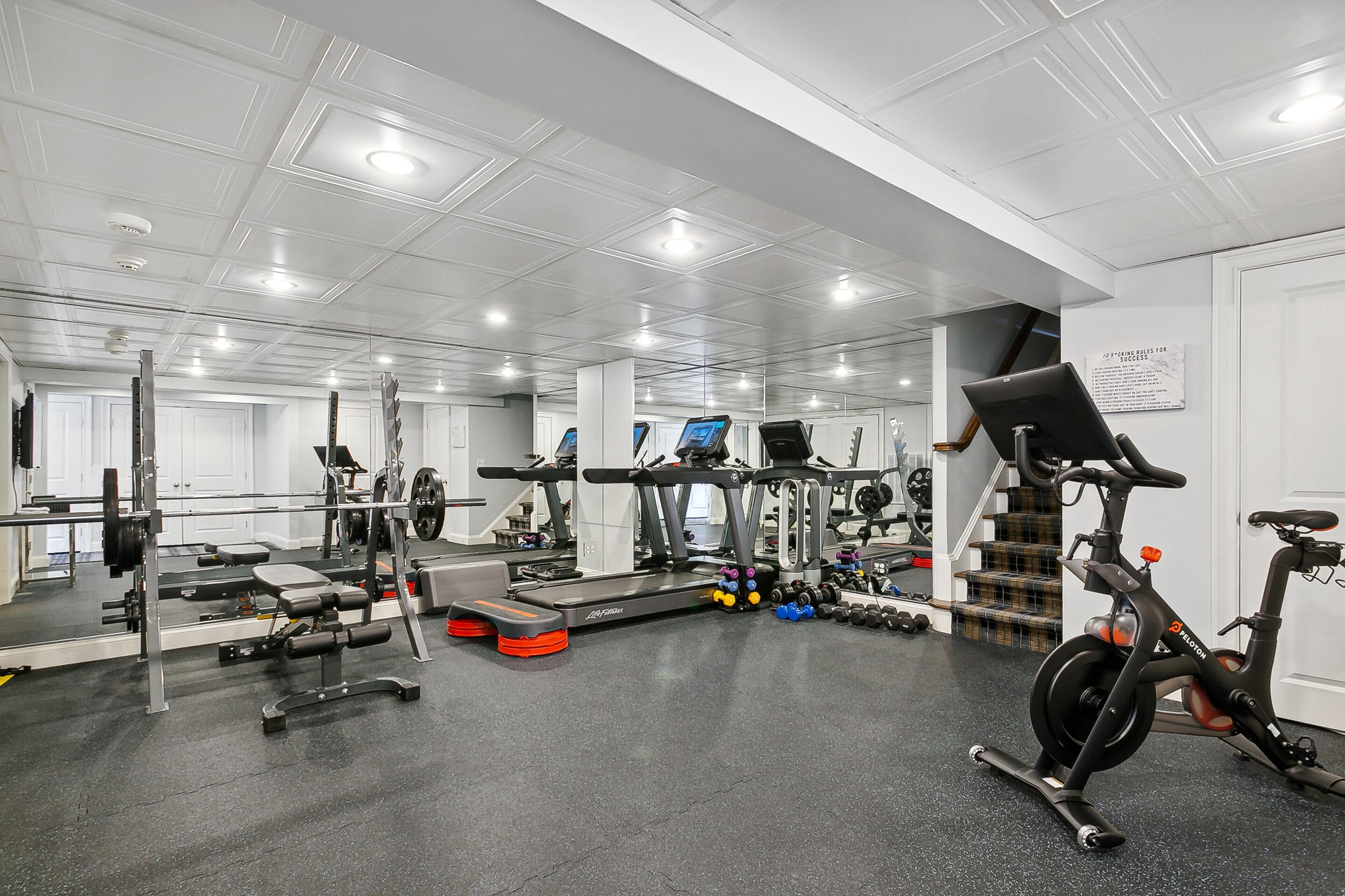 64 Summit Ridge Road New Canaan, CT 06840 - Photo 26 of 39 a view of a room with gym equipment