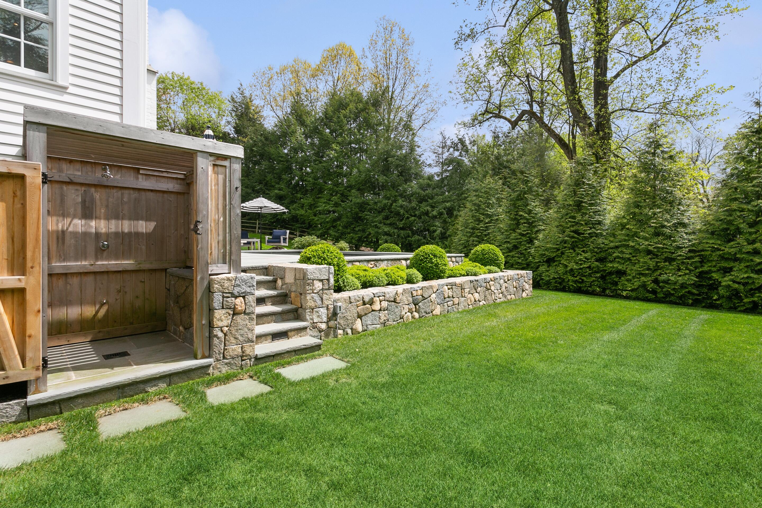 64 Summit Ridge Road New Canaan, CT 06840 - Photo 27 of 39 a view of backyard with a small cabin