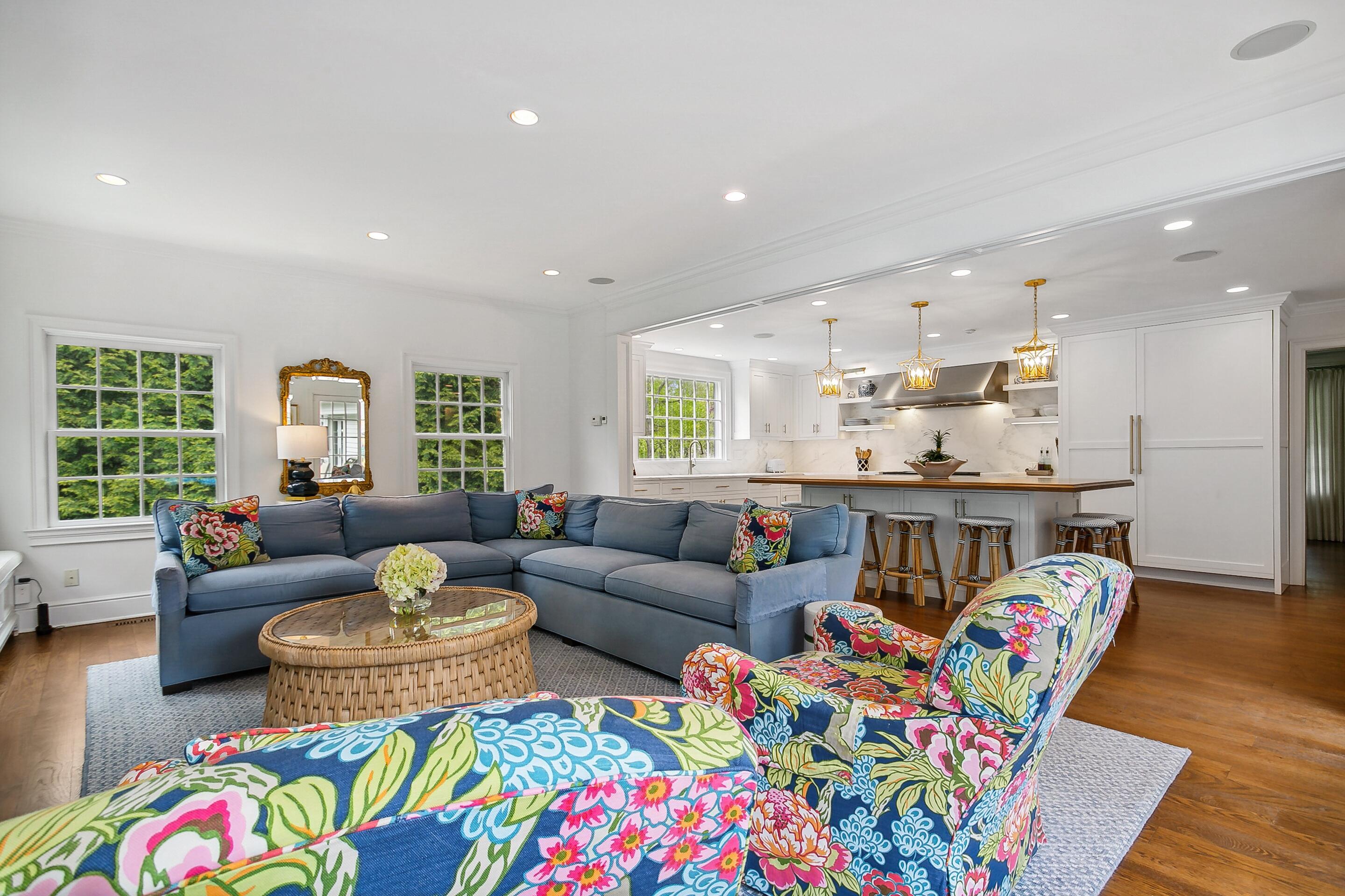64 Summit Ridge Road New Canaan, CT 06840 - Photo 3 of 39 a living room with furniture and a table