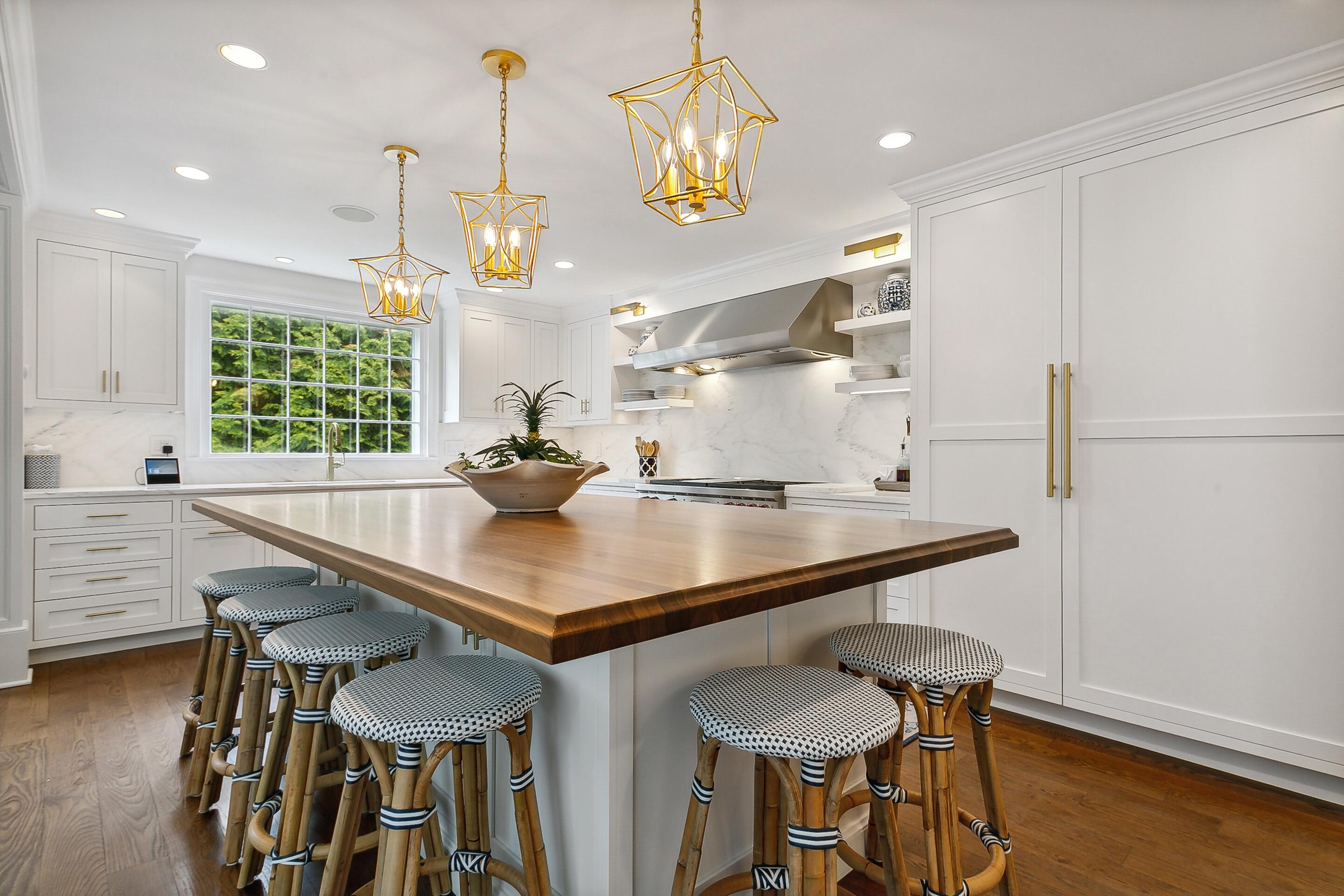 64 Summit Ridge Road New Canaan, CT 06840 - Photo 5 of 39 a kitchen with a table and chairs in it