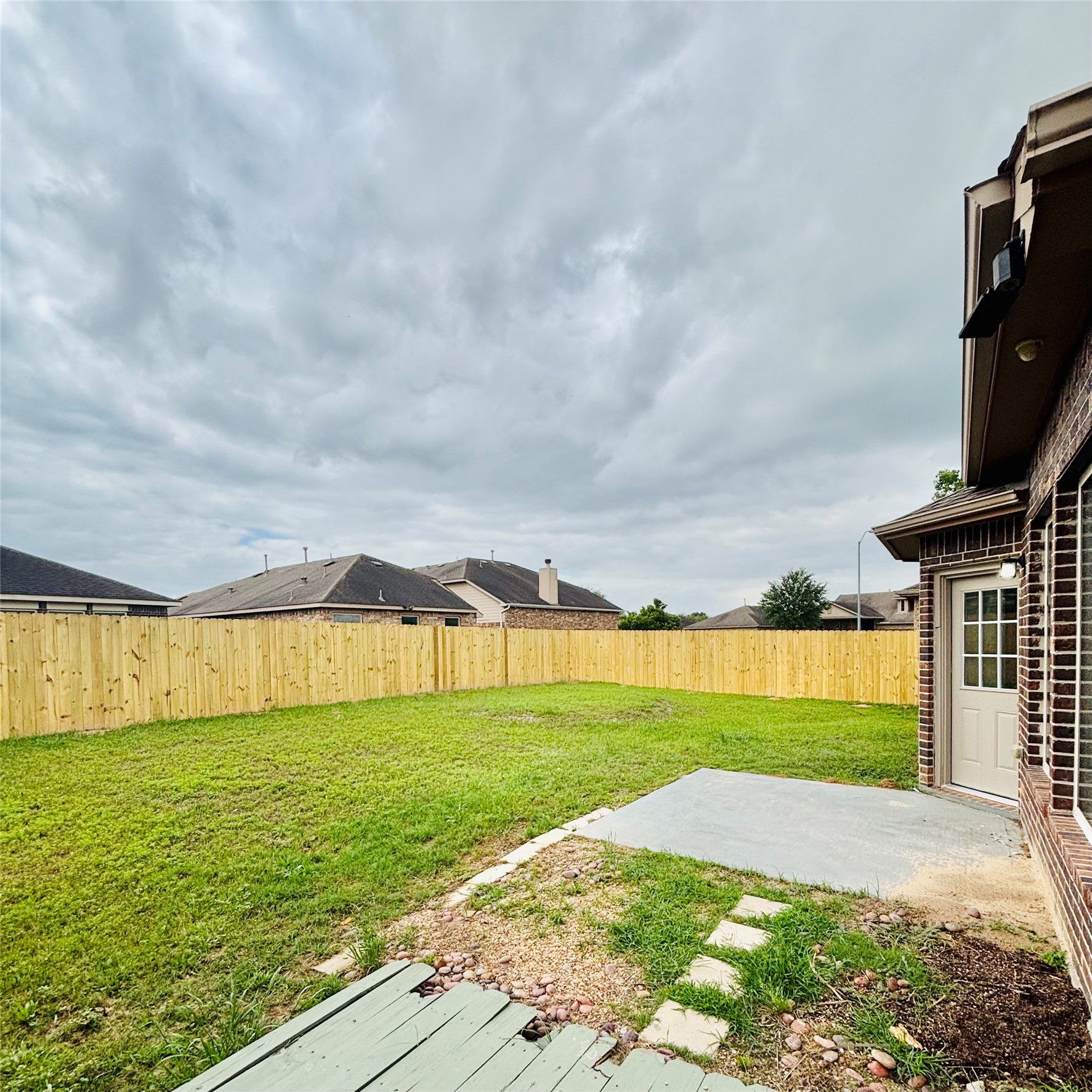 22480 Toronado Ridge Lane Porter, TX 77365 - Photo 37 of 42 a view of an outdoor space and a yard