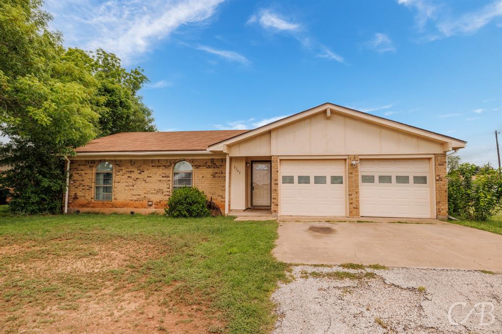 3749 Oldham Lane Abilene, TX 79602 - Photo 1 of 1 a view of a house with a yard and large trees