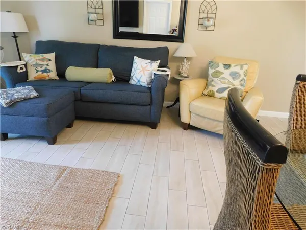 a living room with furniture and a couch