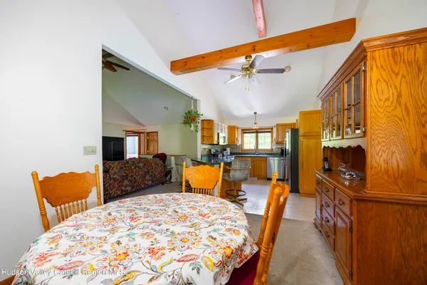 a bedroom with furniture and wooden floor