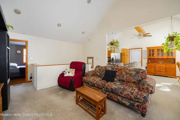 a living room with furniture and a couch