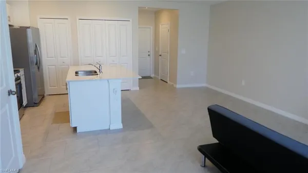 a view of storage and utility room with a sink
