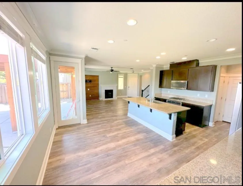 5311 Gramercy Circle Fairfield, CA 94533 - Photo 24 of 54 a large space with a large window and wooden floor