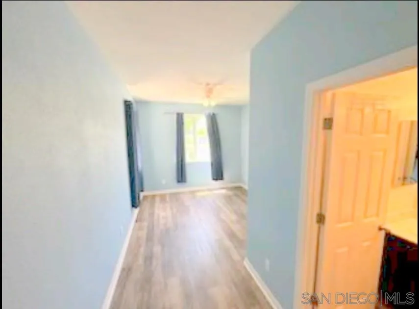 5311 Gramercy Circle Fairfield, CA 94533 - Photo 27 of 54 a view of hallway with wooden floor and front door
