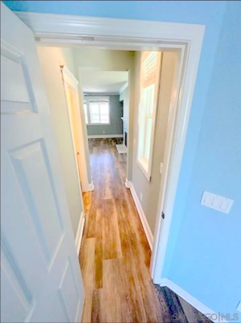 5311 Gramercy Circle Fairfield, CA 94533 - Photo 32 of 54 a view of a hallway with wooden floor and a bathroom