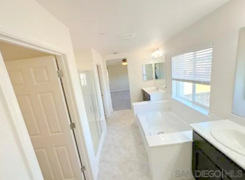 5311 Gramercy Circle Fairfield, CA 94533 - Photo 43 of 54 a bathroom with a sink a toilet a window and vanity