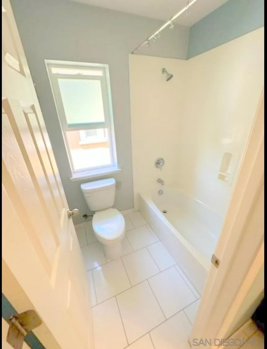 5311 Gramercy Circle Fairfield, CA 94533 - Photo 46 of 54 a bathroom with a granite countertop sink a toilet and shower