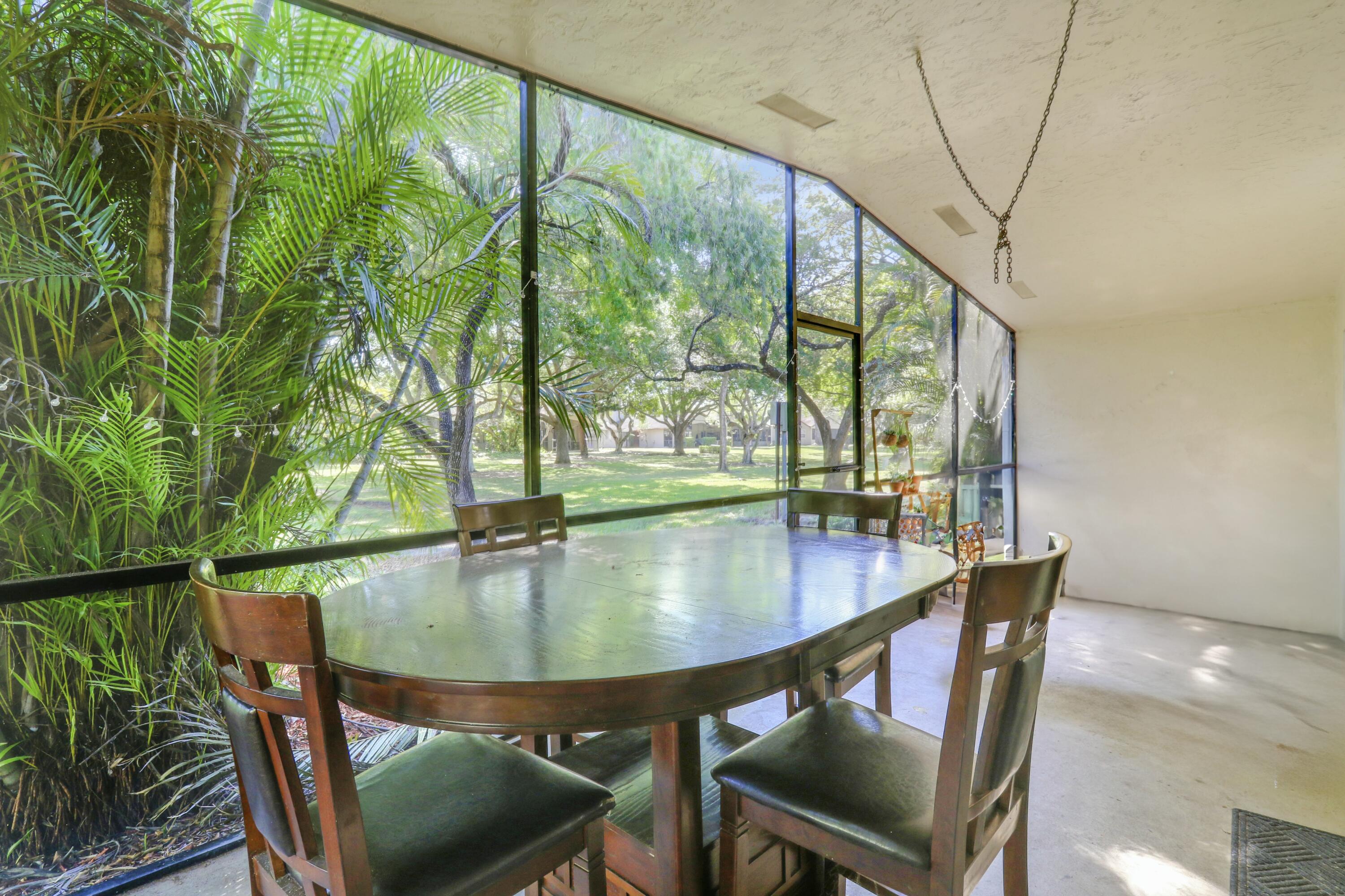 22274 Misty Woods Way Boca Raton, FL 33428 - Photo 16 of 42 Screened Patio