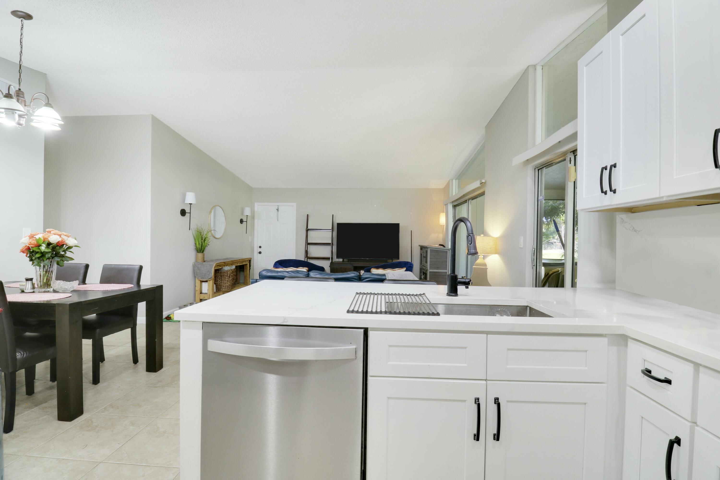 22274 Misty Woods Way Boca Raton, FL 33428 - Photo 3 of 42 Kitchen-Dining-Living