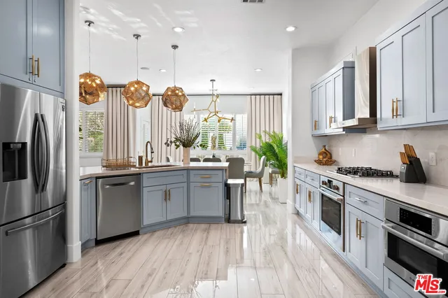 a view of workspace filled with furniture and windows