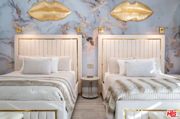 a view of a park with swings and slides