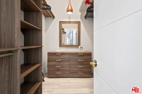 a view of a swimming pool with outdoor seating