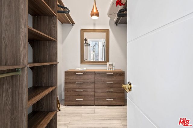 a view of a swimming pool with outdoor seating