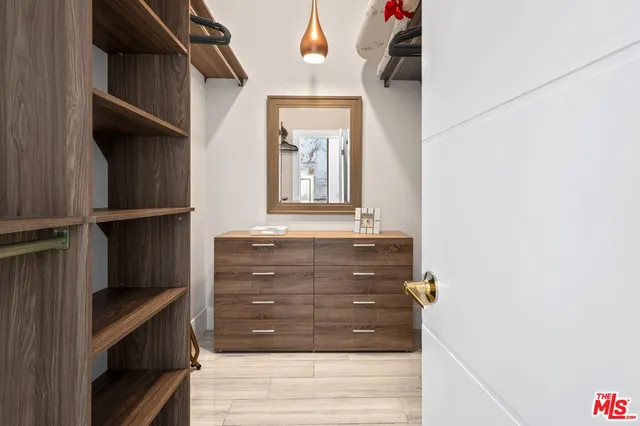 a view of a swimming pool with outdoor seating