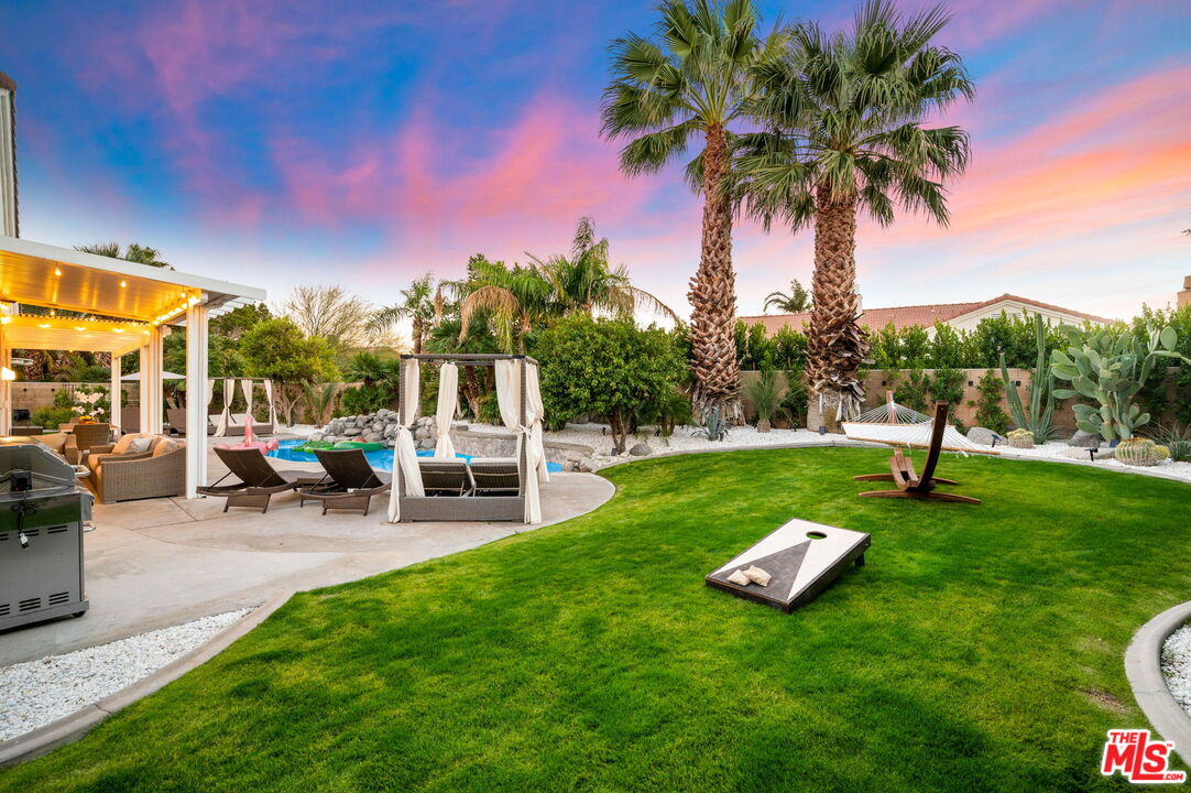 1083 East Circulo San Sorrento Road Palm Springs, CA 92262 - Photo 62 of 70 a view of a park with swings and slides