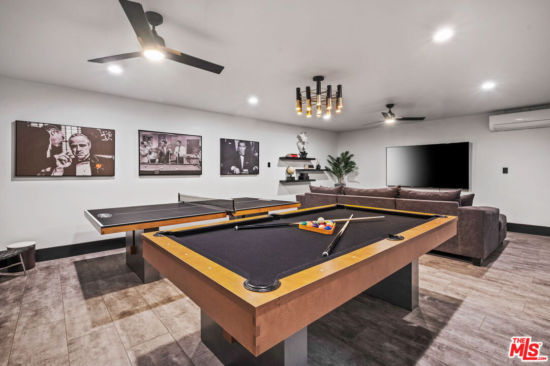 1083 East Circulo San Sorrento Road Palm Springs, CA 92262 - Photo 7 of 70 a room with furniture pool table and painting on the wall