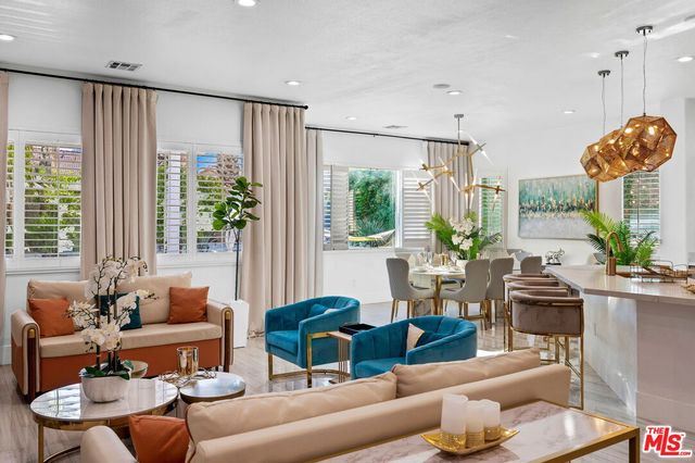 a bathroom with a granite countertop sink mirror and shower