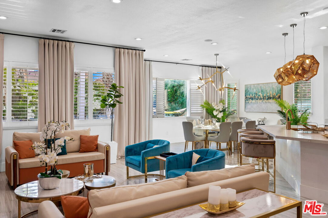 1083 East Circulo San Sorrento Road Palm Springs, CA 92262 - Photo 8 of 70 a living room with furniture and a large window