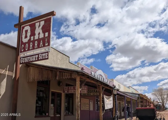 a dinning table and chairs in a room
