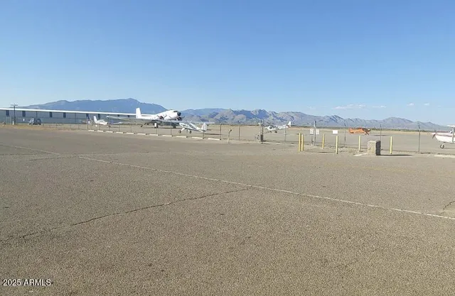 a view of an ocean and mountain
