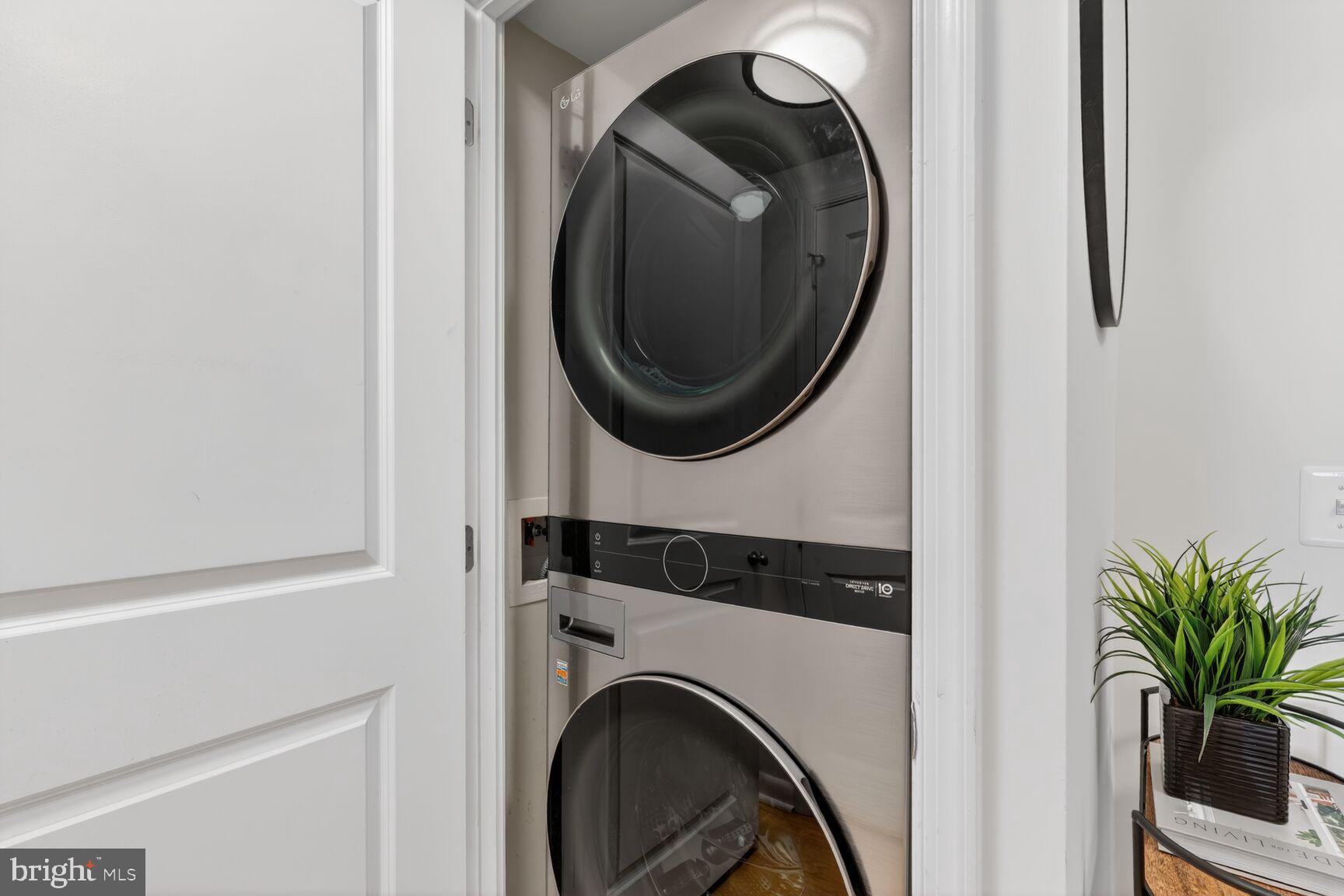 851 North Glebe Road, Unit 817 Arlington, VA 22203 - Photo 18 of 29 a close view of a utility room with dryer and washer