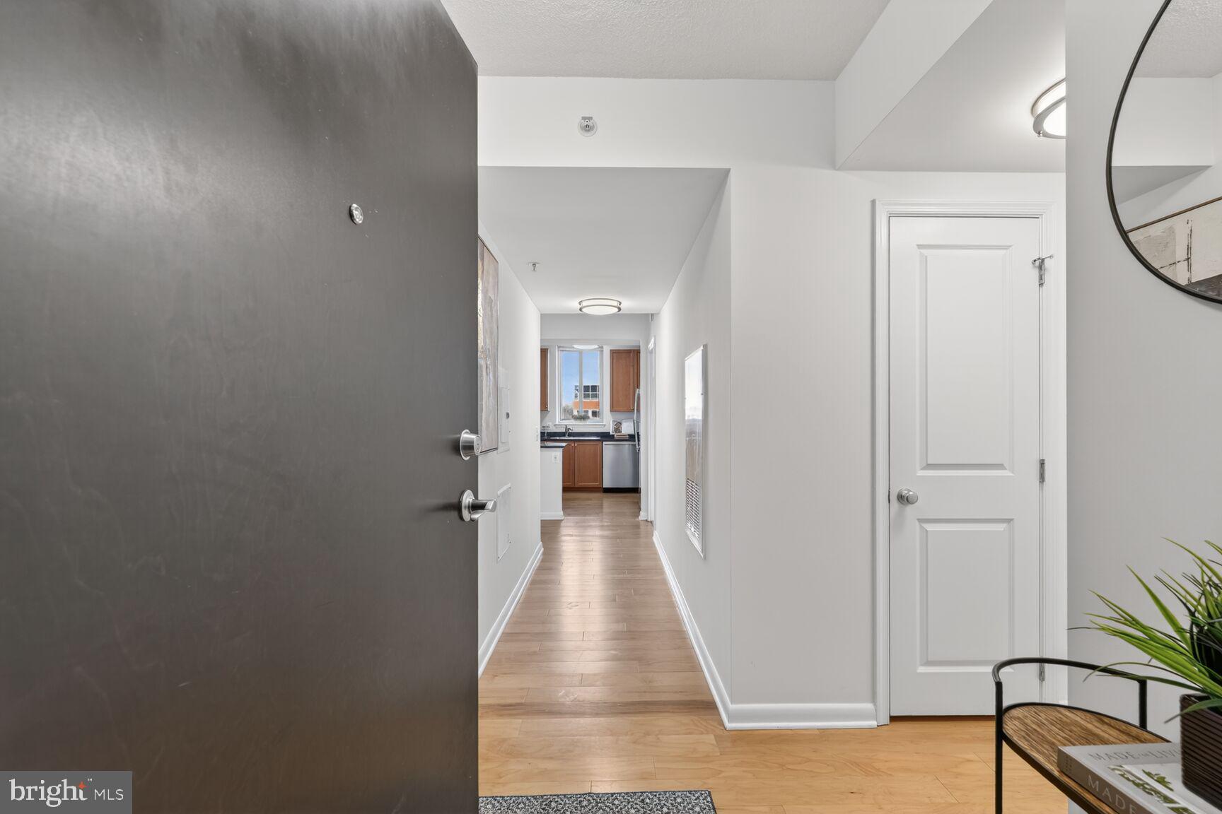 851 North Glebe Road, Unit 817 Arlington, VA 22203 - Photo 2 of 29 a view of a hallway with wooden floor