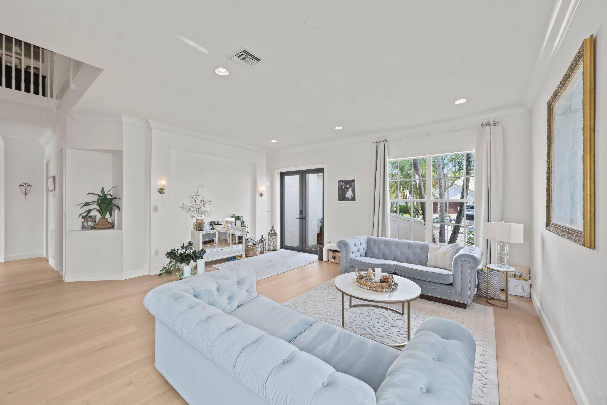 19650 Estuary Drive Boca Raton, FL 33498 - Photo 11 of 83 a living room with furniture and a large window