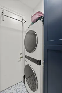 a bathroom with a glass shower door and a glass door