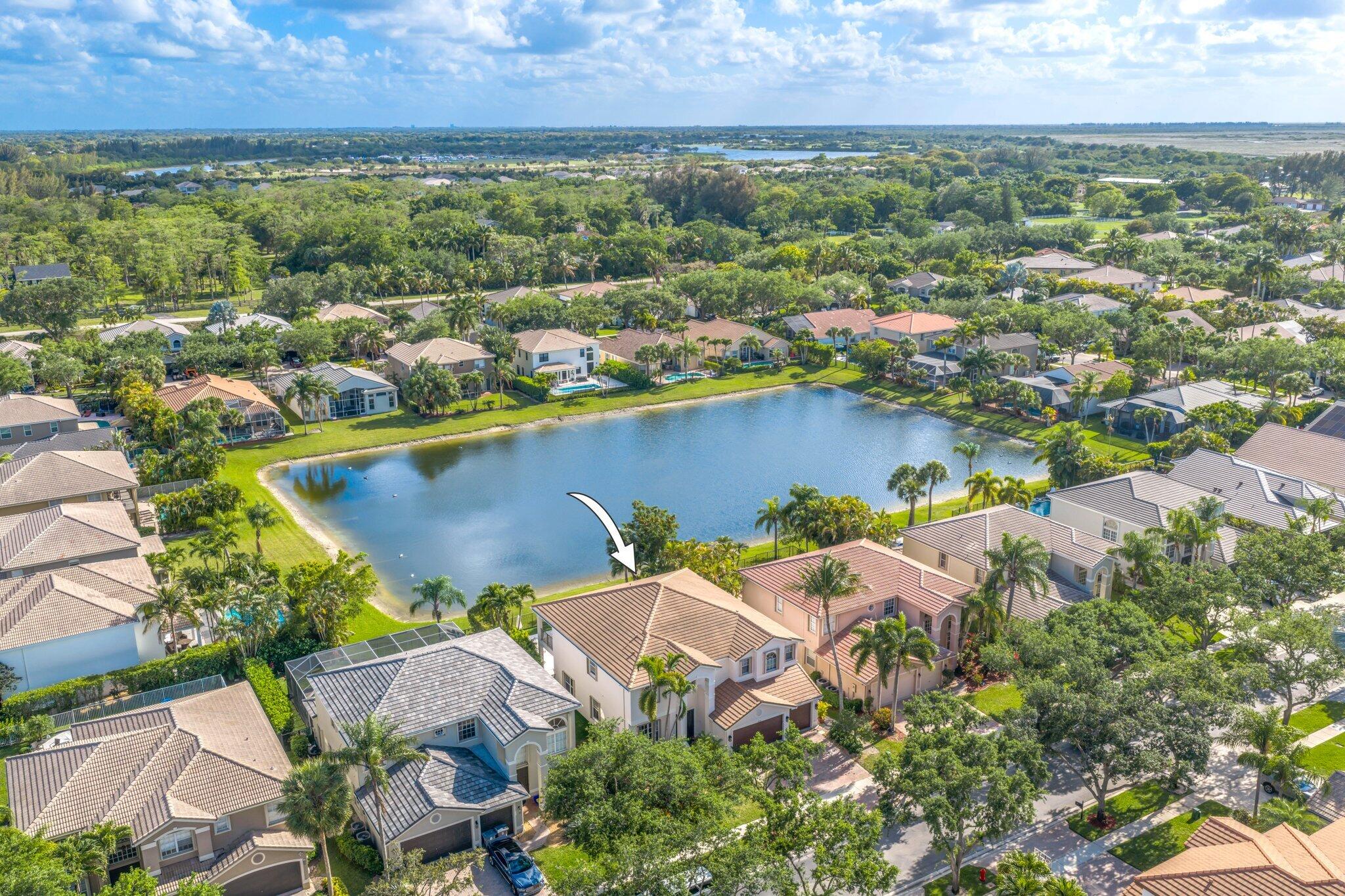 19650 Estuary Drive Boca Raton, FL 33498 - Photo 72 of 83 an aerial view of residential houses with outdoor space and trees all around